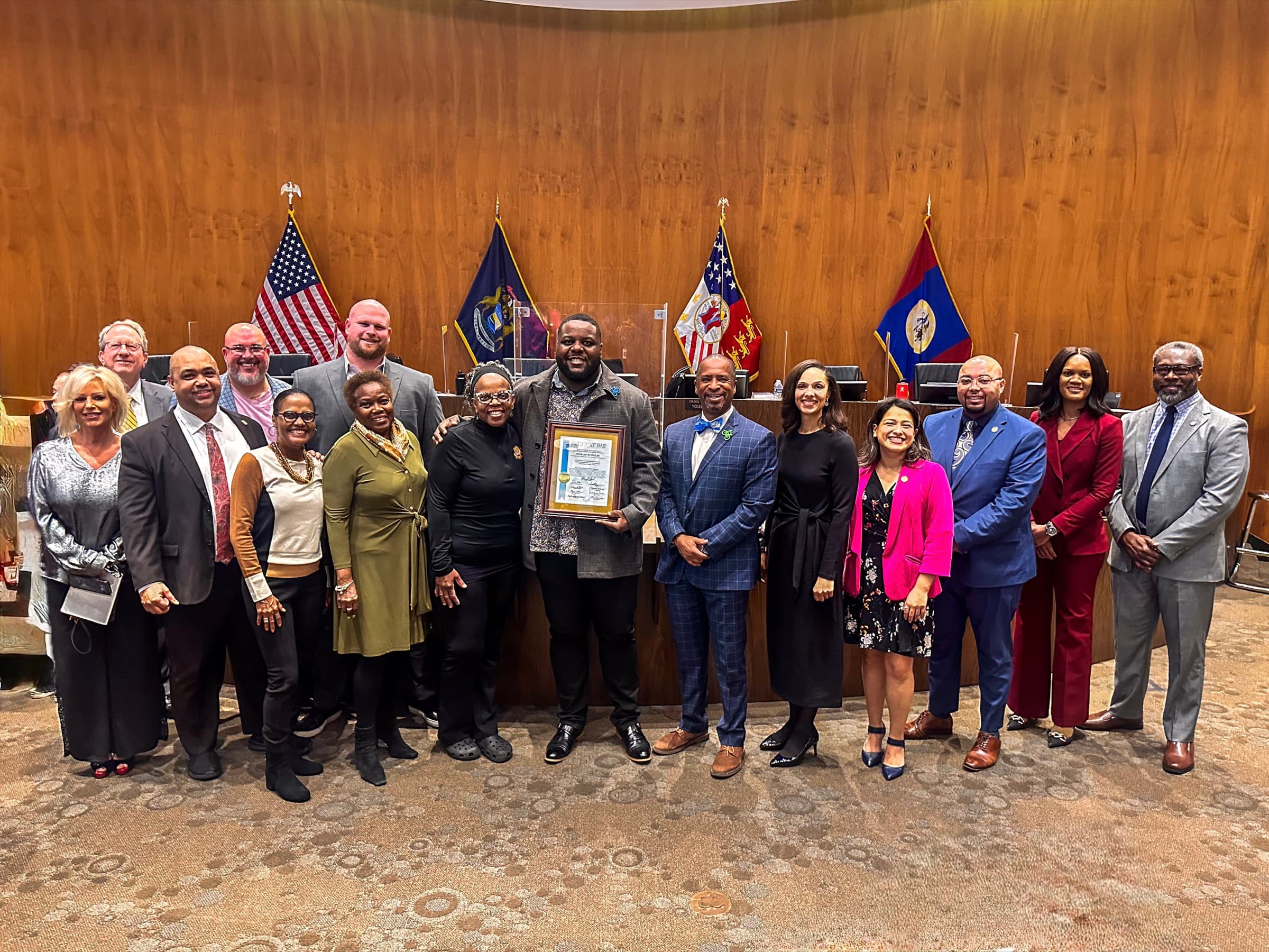 Caj Reynolds receiving Spirit of Detroit recognition from Detroit City Council